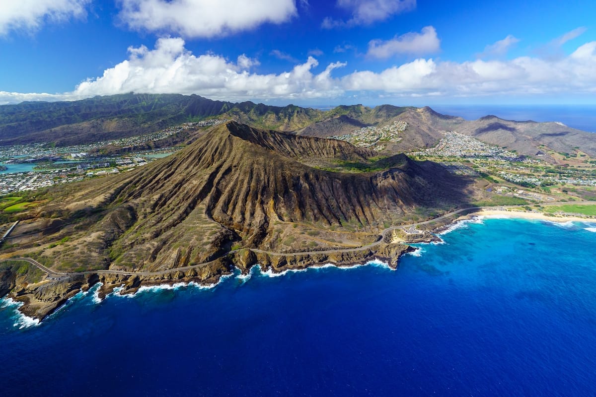 Flying above Diamond Head on one of the best Oahu helicopter tours