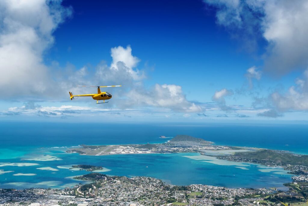 Flying over Kaneohe on an Oahu helicopter tour
