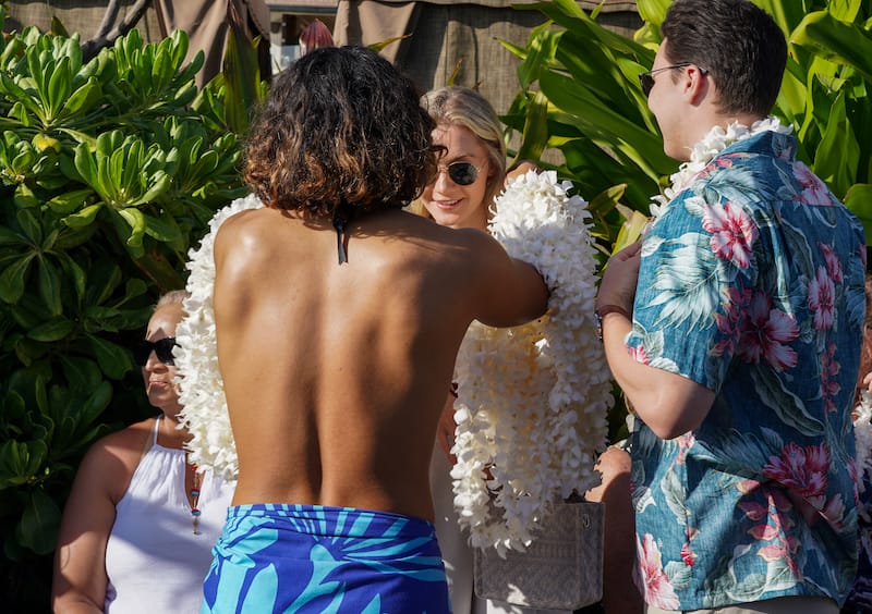 Getting a lei when entering the luau